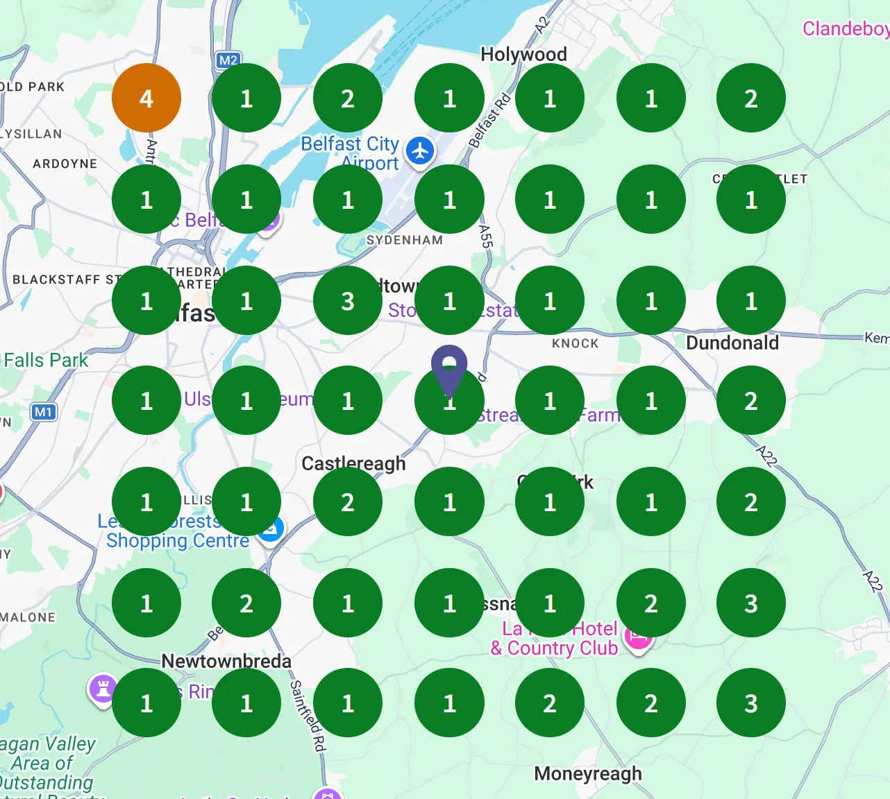 Google Maps geo-grid for "custom cakes" showing Bakes by Vita's ranking across Belfast